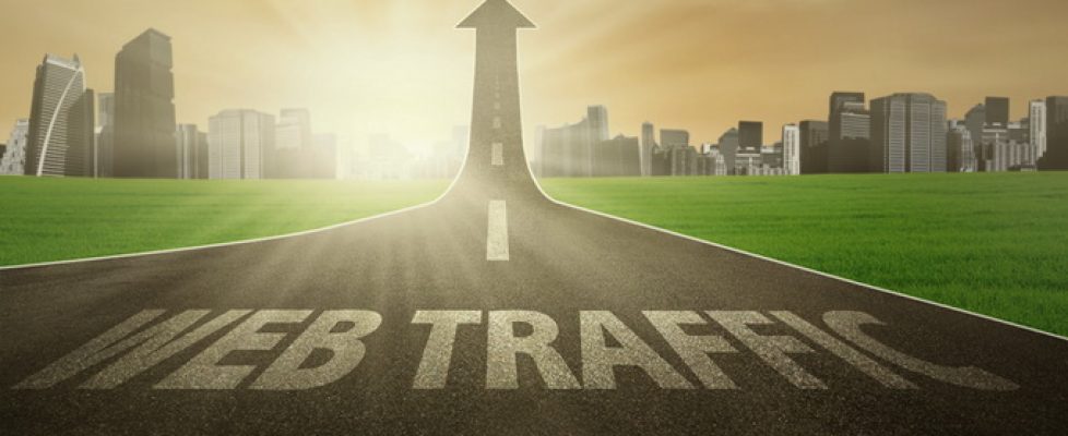 Road rises upward with web traffic text